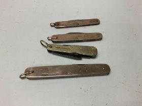 Four 9ct gold mounted pen knifes.