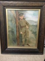 A framed watercolour of a WW1 soldier. Frame dimen