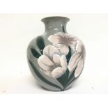 A Lladro floral vase ,28cm tall. Postage category