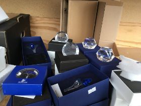 A box containing a large collection of Swarovski i