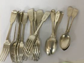 A collection of silver cutlery spoons and folks mi