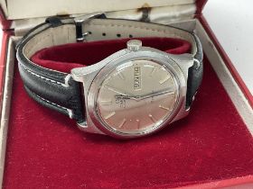 An omega Geneve day/date stainless steel case auto