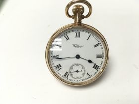 A 9ct gold cased Waltham pocket watch. Winds and r