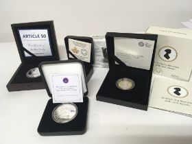 Four Silver proof collectors coins in fitted boxes