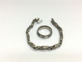 A titanium ring and bracelet (2). Shipping categor