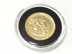 A 1820 George III full sovereign. Postage B