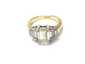 An 18ct gold and platinum ring set with a central