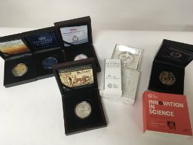 A collection of silver proof limited edition coins