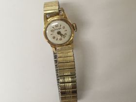 A ladies 18carat gold Avia cased watch with a late