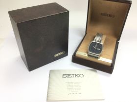 A boxed Seiko automatic watch. Shipping category B