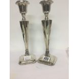 A pair of silver candle Chester hallmarks. 30 cm