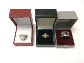 A 9ct gold ring 3.69g and two others.