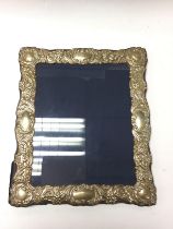 A silver photo frame, Sheffield hallmarks 32cm x 2