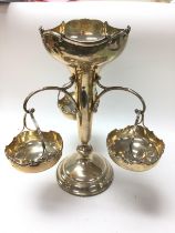 A silver trumpet vase with 3 hanging baskets, Ches