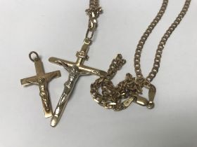 A 9 ct gold cross on chain and one other 9 ct gold cross pendant total weight 11 grams.