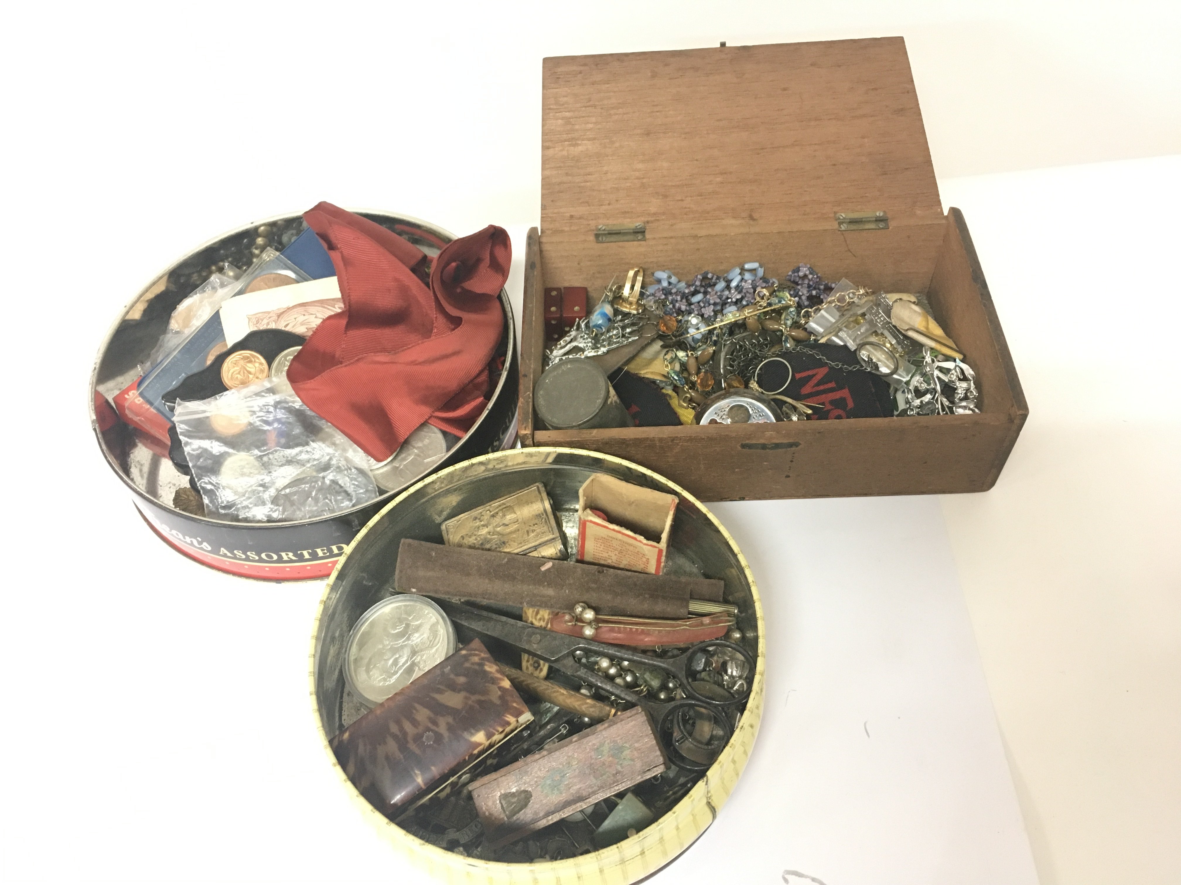 Two tins and a wooden box containing costume jewel