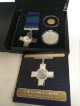 The George Cross gold and silver proof coin set co