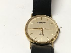 A vintage 9ct gold Ingersoll watch with a quartz m