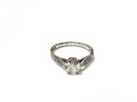 A 9ct white gold ring set with a single white ston