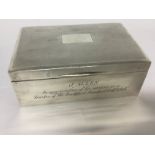 A silver cigarette box the hinged lit with lined i