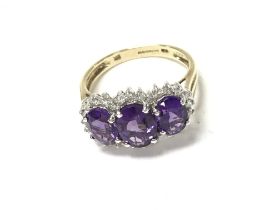 9ct yellow and white gold triple amethyst and diam