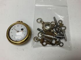 A miniature verge gilt metal watch and watch keys.