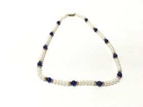 A pearl necklace with a 9ct gold clasp. 44cm lengt