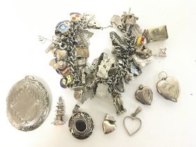 A Silver charm bracelet and other items including