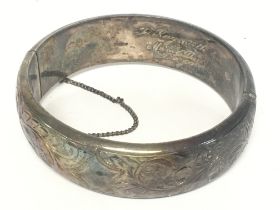 A silver hallmarked bangle, postage category A