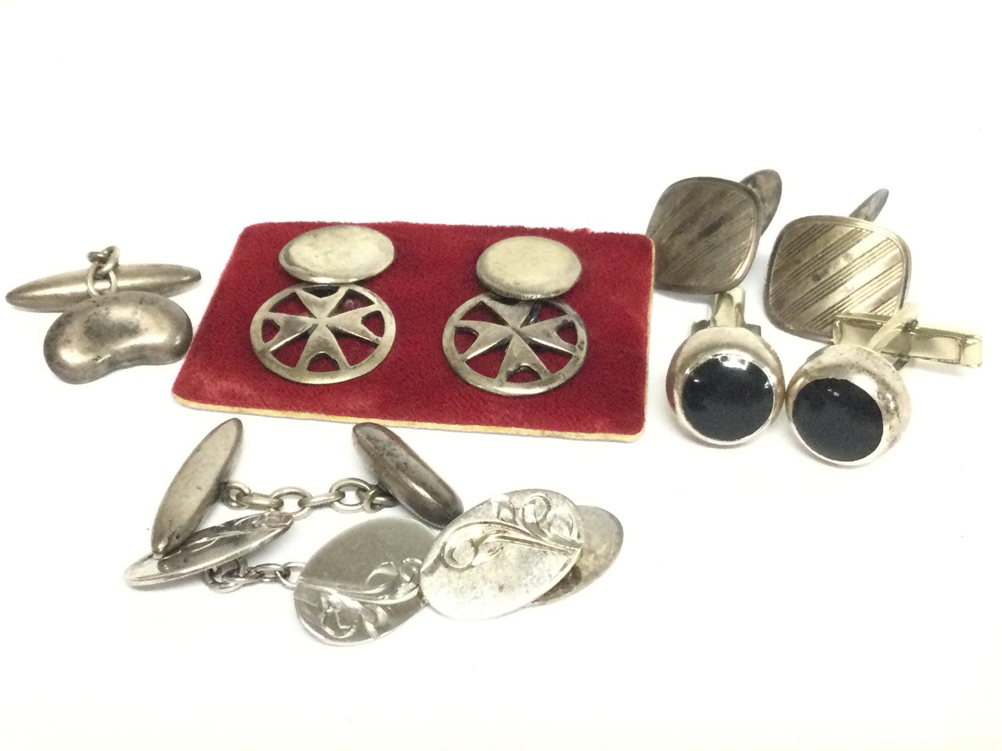 A collection of silver cufflinks, postage category