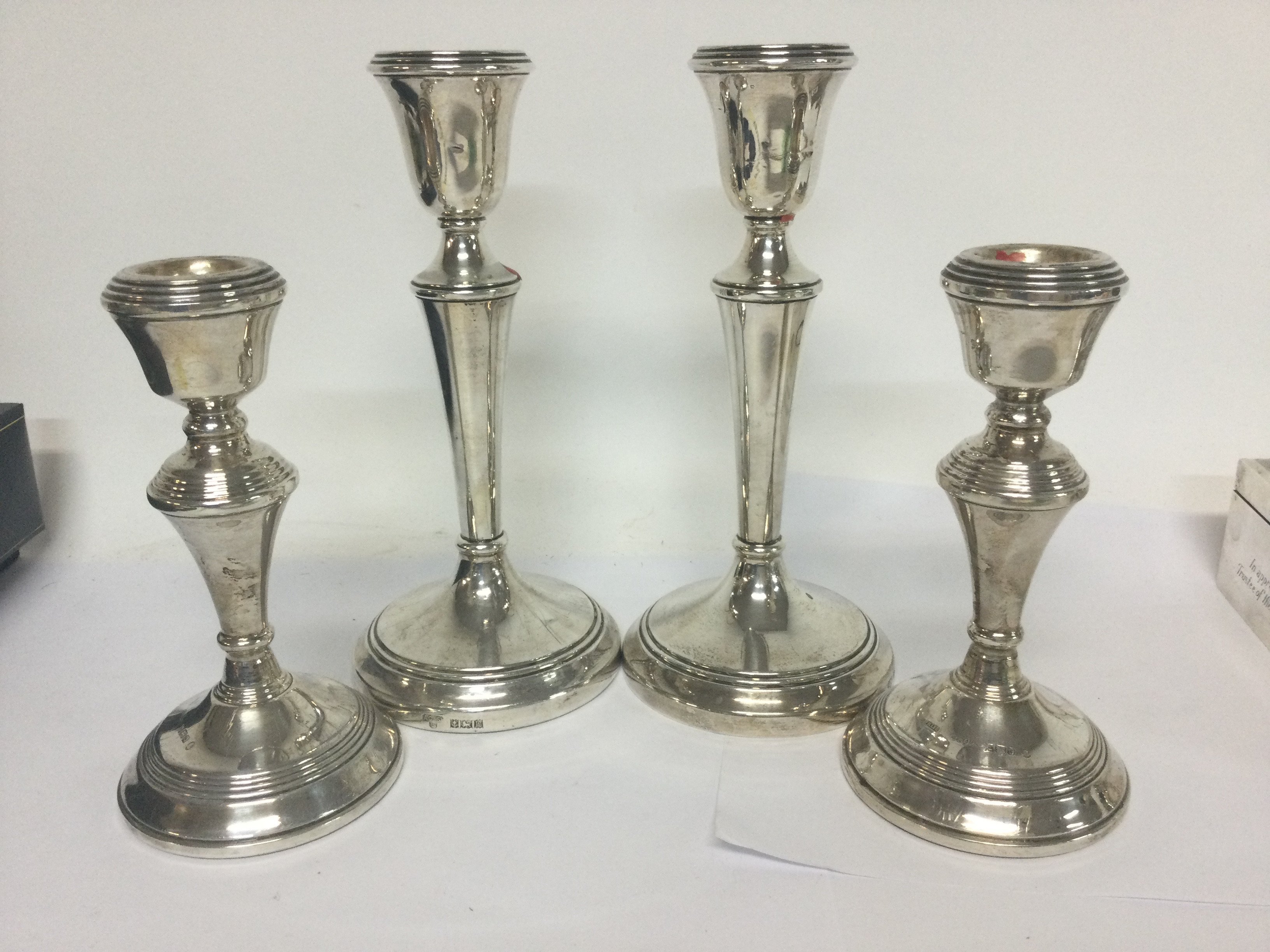 Two pairs of silver candle sticks Birmingham hallm