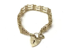 9ct gold gate bracelet. 27.76gPostage B