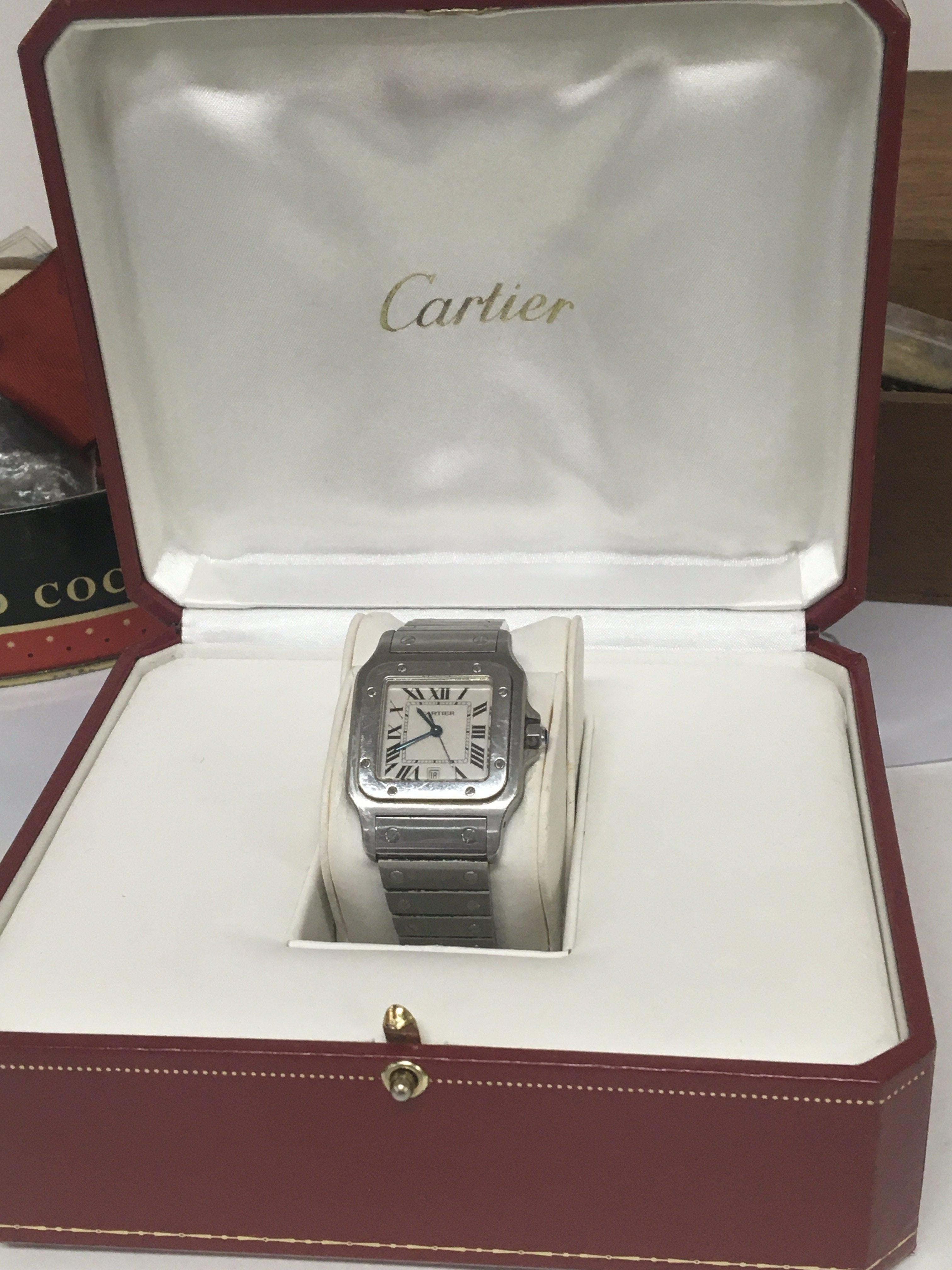 A ladies Cartier Santos stainless steel watch with