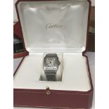 A ladies Cartier Santos stainless steel watch with