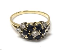 A 9 carat gold sapphire and diamond set ring , siz