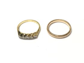 A 9ct gold wedding band size L and 2.46g and an 18