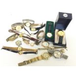 A collection of vintage mens and womens watches in