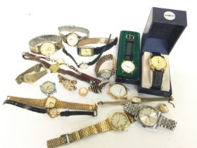 A collection of vintage mens and womens watches in