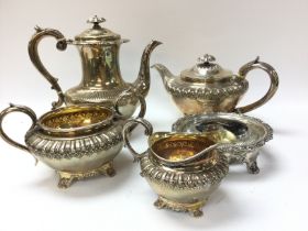 A cased silver four pieced tea set, comprising tea