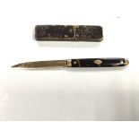 A 14ct gold (unmarked) and tortoiseshell folding p