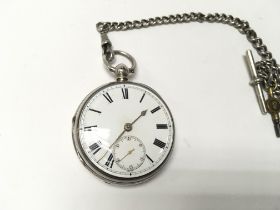 A silver keywind pocket watch with Albert chain. W