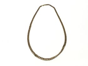 A 9ct gold chain. 32.98g and 57cm long. Postage A