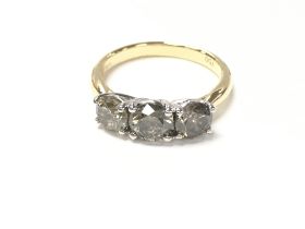 18ct white and yellow gold RBC diamond trilogy rin