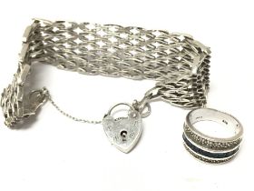 A silver ring (size N) and gate bracelet , postage