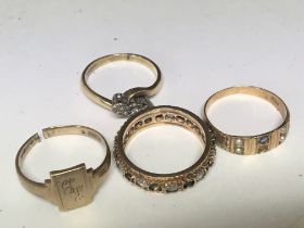 Two 9carat gold rings an eternity ring set with al