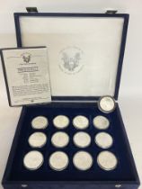 A collection of cased American 1998 Silver Eagle c