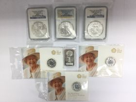 A small collection of silver proof coins. Shipping