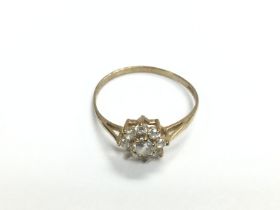 A small 9ct gold ring set with CZs, approx 1.2g an