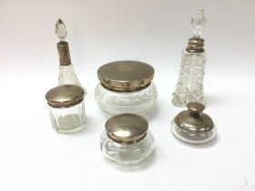Two cut glass silver collar perfume bottles & four