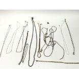 A collection of assorted silver and other chains a